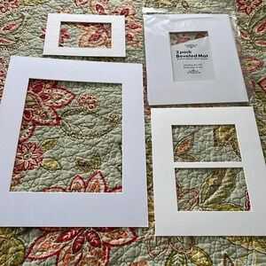 5 new/unused white picture frame mats. Sizes shown in pics.